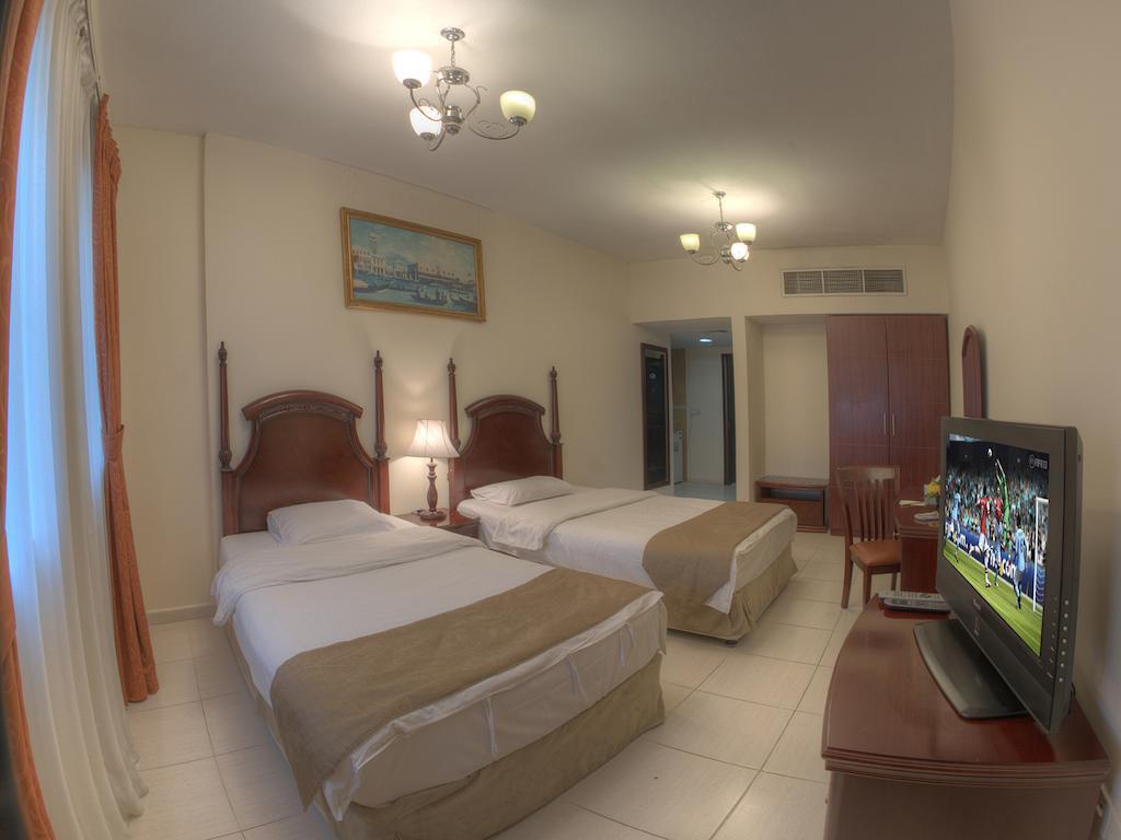 Tulip Inn Royal Suites Acman Oda fotoğraf