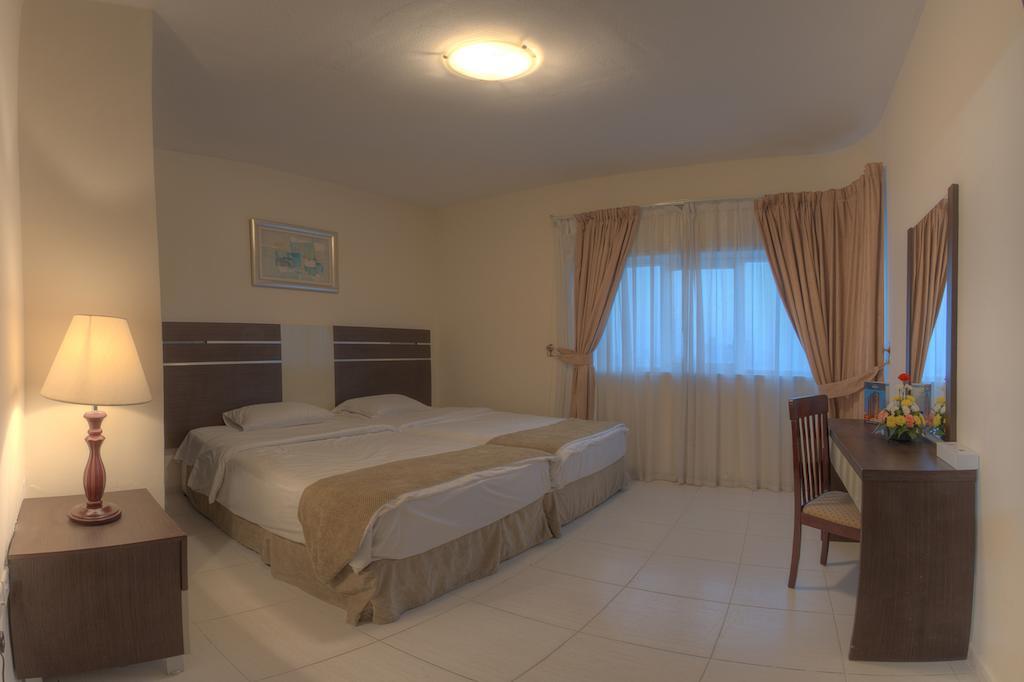Tulip Inn Royal Suites Acman Oda fotoğraf