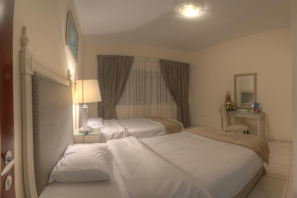 Tulip Inn Royal Suites Acman Oda fotoğraf