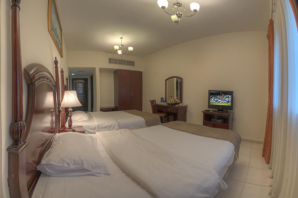 Tulip Inn Royal Suites Acman Oda fotoğraf